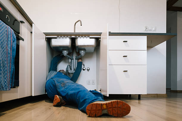 Professional Plumbing technician working in Darien, CT